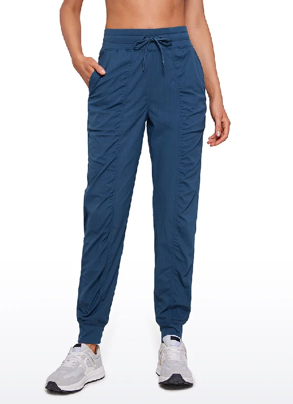 Plus Size Women's Patchwork - Design Jeans for a Unique AppearanceStriped Joggers with Pockets 28'' - Ruched Plus Size Women's Patchwork - Design Jeans for a Unique AppearanceStriped Joggers with Pockets 28'' - Ruched