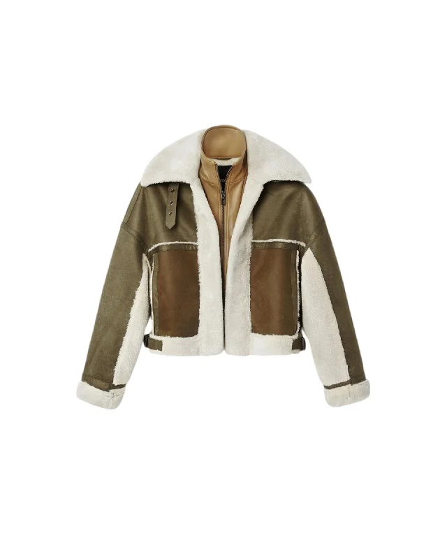 Women's cropped leather coats with silver studs for an edgy lookDesigual Women's Green Faux Leather Biker Jacket with Sheepskin Lining Women's cropped leather coats with silver studs for an edgy lookDesigual Women's Green Faux Leather Biker Jacket with Sheepskin Lining