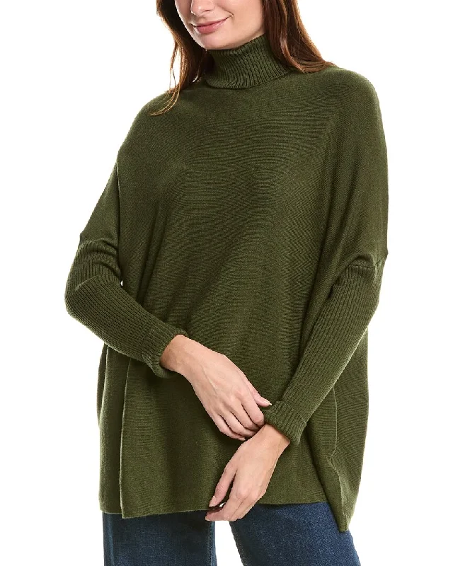 Checkered women's wool coats in a classic pattern for a timeless styleJoseph A. Solid Poncho Checkered women's wool coats in a classic pattern for a timeless styleJoseph A. Solid Poncho