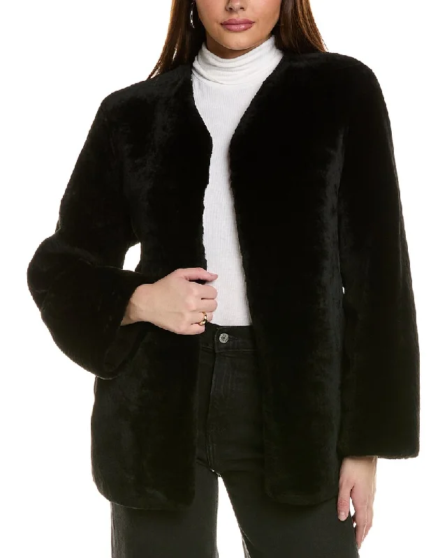Long women's mac coats in a lightweight fabric for spring showersGorski Collarless Shearling Jacket Long women's mac coats in a lightweight fabric for spring showersGorski Collarless Shearling Jacket