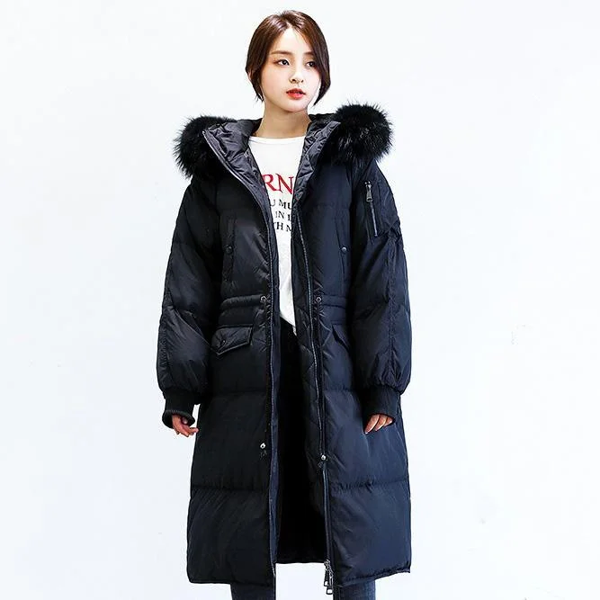 Women's cropped leather coats with silver studs for an edgy lookElegant black down jacket woman Loose fitting tie waist down jacket fur collar coats