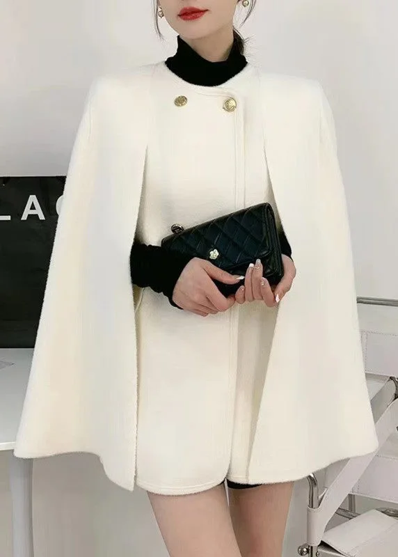 Women's cropped leather coats with silver studs for an edgy lookElegant White O-Neck Knit Patchwork Cape And Woolen Coats Two Piece Set Women's cropped leather coats with silver studs for an edgy lookElegant White O-Neck Knit Patchwork Cape And Woolen Coats Two Piece Set