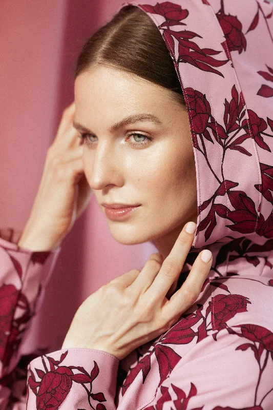 Long women's mac coats in a lightweight fabric for spring showersFitted and Flared Coat with Pleated Skirt in Pink and Red | 'Peony Bloom' Long women's mac coats in a lightweight fabric for spring showersFitted and Flared Coat with Pleated Skirt in Pink and Red | 'Peony Bloom'