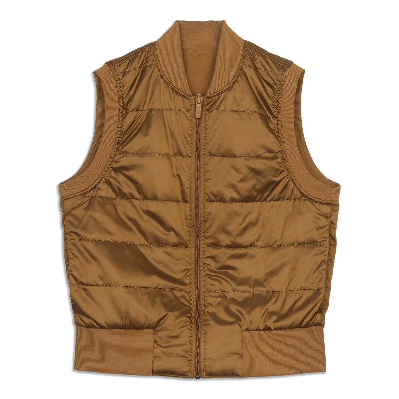 Hooded women's puffer coats in neon colors for high - visibility sportsNon-Stop Bomber Vest Hooded women's puffer coats in neon colors for high - visibility sportsNon-Stop Bomber Vest
