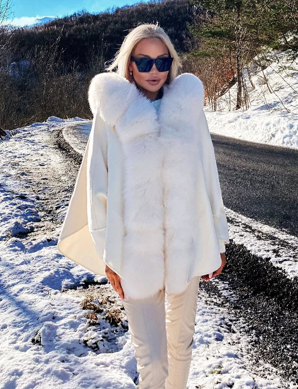 Mid - length women's down coats in a slim fit for a modern and sleek appearanceOversized Australian Wool Fox Fur Trim Poncho sun White Mid - length women's down coats in a slim fit for a modern and sleek appearanceOversized Australian Wool Fox Fur Trim Poncho sun White