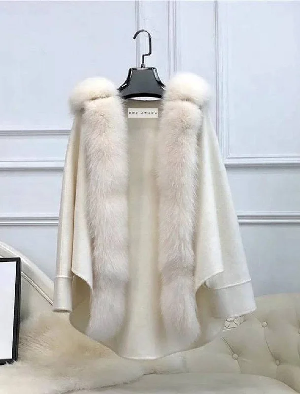 Checkered women's wool coats in a classic pattern for a timeless styleOversized Australian Wool Fox Fur Trim Poncho Checkered women's wool coats in a classic pattern for a timeless styleOversized Australian Wool Fox Fur Trim Poncho