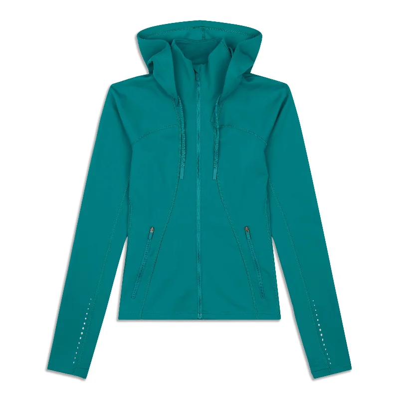 Long women's mac coats in a lightweight fabric for spring showersRain-Repellent Run Jacket Long women's mac coats in a lightweight fabric for spring showersRain-Repellent Run Jacket