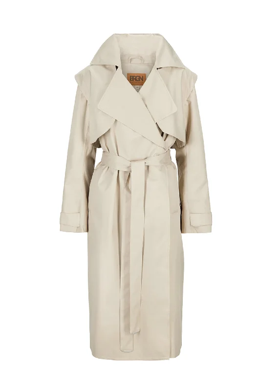 Water - resistant women's trench coats with adjustable cuffs for rainy daysRegndråpe Trench Coat - Sand Water - resistant women's trench coats with adjustable cuffs for rainy daysRegndråpe Trench Coat - Sand