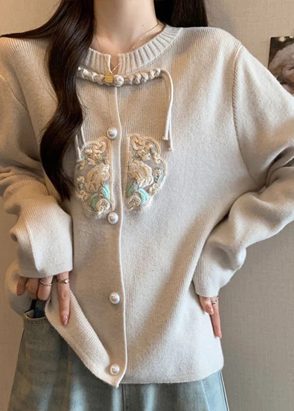 Belted women's cashmere coats in soft pastels for a luxurious feelStyle Apricot Tassel Button Patchwork Knit Coat Fall