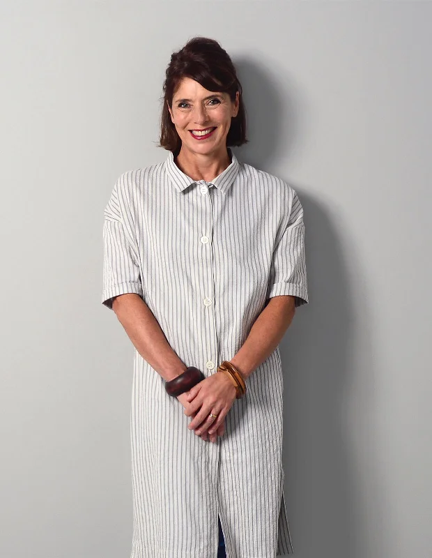 Water - resistant women's trench coats with adjustable cuffs for rainy daysThe Maker's Atelier Oversized Shirt Dress Water - resistant women's trench coats with adjustable cuffs for rainy daysThe Maker's Atelier Oversized Shirt Dress