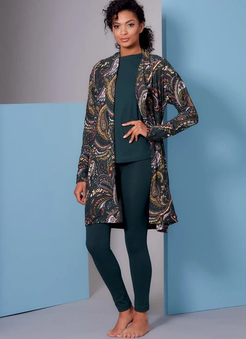 Mid - length women's down coats in a slim fit for a modern and sleek appearanceVogue Robe, Top, Dress and Trousers V1852