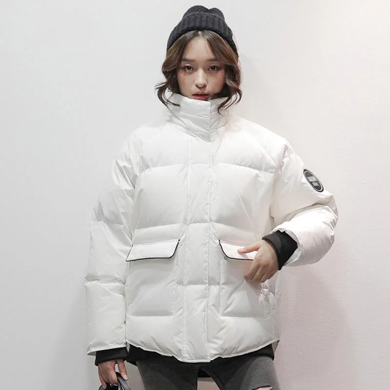 Mid - length women's down coats in a slim fit for a modern and sleek appearanceWarm beige white  down coat winter Loose fitting high neck winter jacket big pockets coats