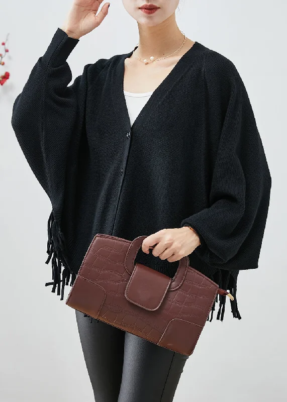 Water - resistant women's trench coats with adjustable cuffs for rainy daysBeautiful Black Oversized Tasseled Knit Coats Fall