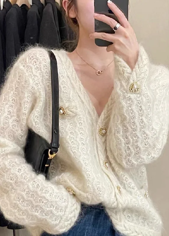 Mid - length women's down coats in a slim fit for a modern and sleek appearanceFrench Apricot Button Hollow Out Patchwork Cotton Knit Coats Fall Mid - length women's down coats in a slim fit for a modern and sleek appearanceFrench Apricot Button Hollow Out Patchwork Cotton Knit Coats Fall