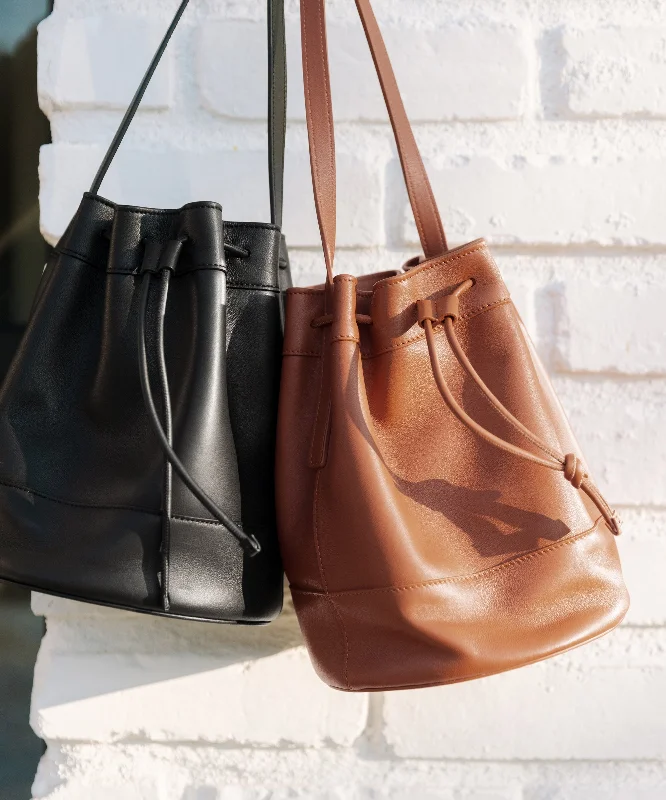 Plus Size Women's Fit - and - Flare Sweater Dresses with Ruffled HemMini Leather Drawstring Bag Plus Size Women's Fit - and - Flare Sweater Dresses with Ruffled HemMini Leather Drawstring Bag