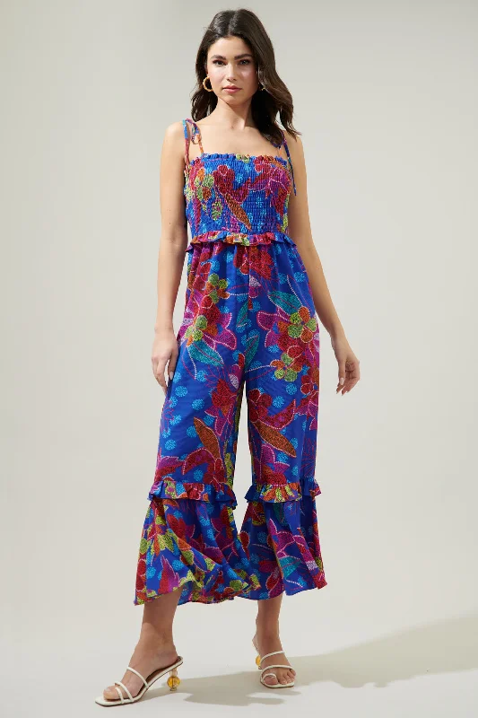 Metallic women jumpsuits for a dazzling New Year's Eve partyAmazonia Blue Jadora Smocked Tie Strap Cropped Jumpsuit Metallic women jumpsuits for a dazzling New Year's Eve partyAmazonia Blue Jadora Smocked Tie Strap Cropped Jumpsuit