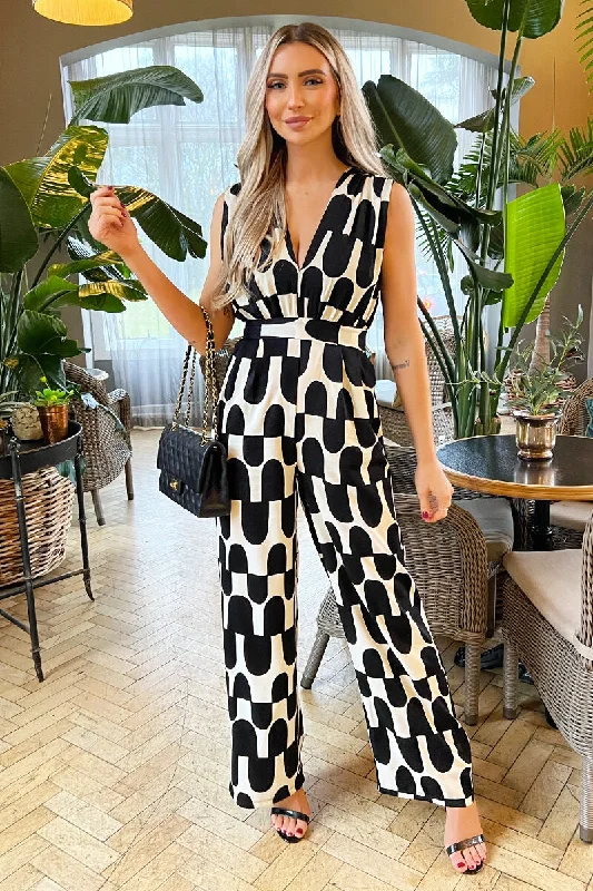 Sheer women jumpsuits with lace panels for a romantic and sexy styleBlack And Cream Abstract Print Jumpsuit Sheer women jumpsuits with lace panels for a romantic and sexy styleBlack And Cream Abstract Print Jumpsuit