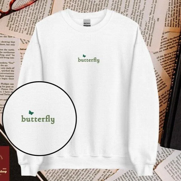 Women's graphic - printed sweatshirt featuring floral patterns for a feminine touchButterfly Stella Alonso Embroidered Sweatshirt Women's graphic - printed sweatshirt featuring floral patterns for a feminine touchButterfly Stella Alonso Embroidered Sweatshirt