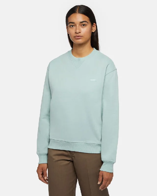 Women's hoodie with a glittery print for a glamorous and sparkly appearanceClancy Sweatshirt in Blue Surf Women's hoodie with a glittery print for a glamorous and sparkly appearanceClancy Sweatshirt in Blue Surf