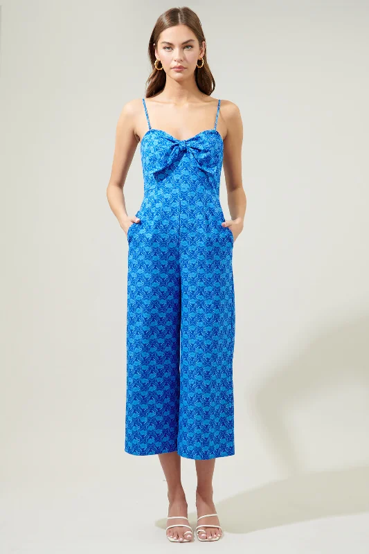 Women jumpsuits with tassel trims for a playful and fashionable touchDriftwood Floral Caruso Bow Tie Cropped Jumpsuit Women jumpsuits with tassel trims for a playful and fashionable touchDriftwood Floral Caruso Bow Tie Cropped Jumpsuit