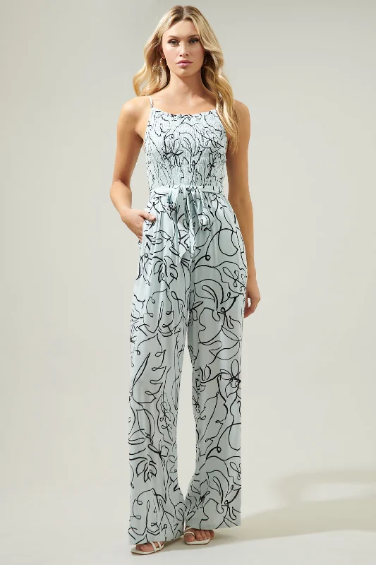 Women jumpsuits with asymmetric hems on the pants for a fashion - forward and dynamic lookGrow With You Galveston Smocked Jumpsuit Women jumpsuits with asymmetric hems on the pants for a fashion - forward and dynamic lookGrow With You Galveston Smocked Jumpsuit