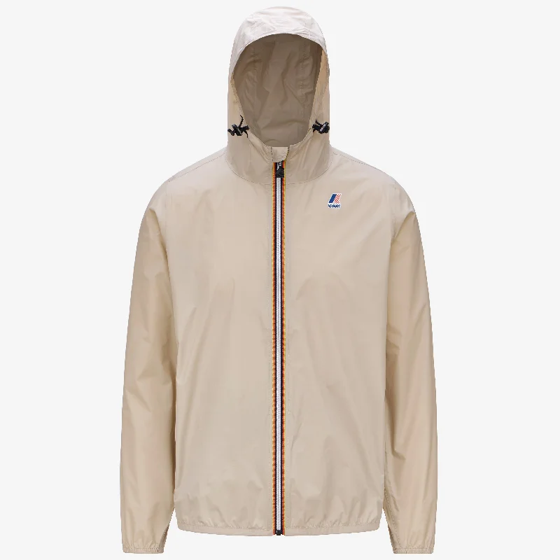 Women's bomber jackets with a holographic finish for a futuristic and eye - catching lookClaude - Unisex Packable Full Zip Waterproof Rain Jacket in Beige Sand Women's bomber jackets with a holographic finish for a futuristic and eye - catching lookClaude - Unisex Packable Full Zip Waterproof Rain Jacket in Beige Sand