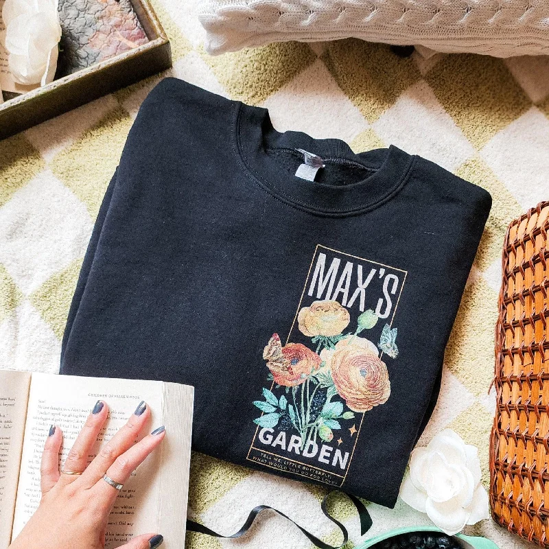 Women's cropped sweatshirt with a slogan graphic for a fun and expressive lookMax's Garden Sweatshirt Women's cropped sweatshirt with a slogan graphic for a fun and expressive lookMax's Garden Sweatshirt