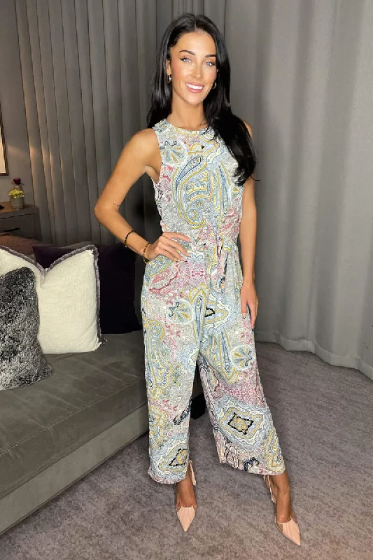 Women jumpsuits with asymmetric hems on the pants for a fashion - forward and dynamic lookMulti Printed Sleeveless Knot Front Jumpsuit Women jumpsuits with asymmetric hems on the pants for a fashion - forward and dynamic lookMulti Printed Sleeveless Knot Front Jumpsuit