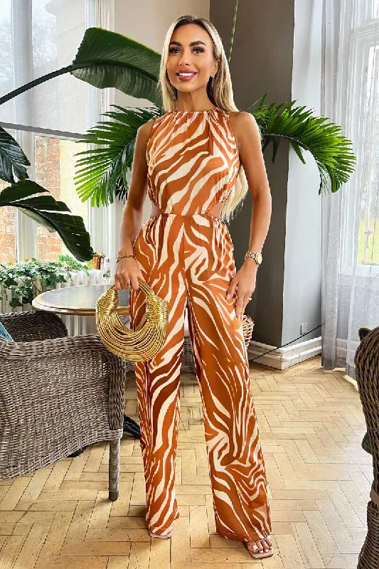 Ruffled women jumpsuits with a feminine touch for a date nightRust Printed Cut Out Jumpsuit Ruffled women jumpsuits with a feminine touch for a date nightRust Printed Cut Out Jumpsuit