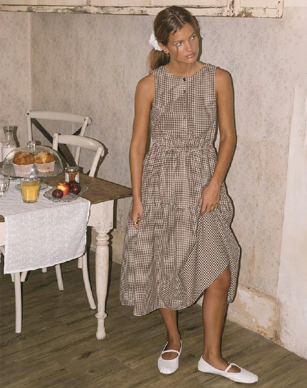 Maxi - inspired midi dresses with flowing fabrics for a beachy vibeGaluh Smock Dress in Mini Brown Gingham Maxi - inspired midi dresses with flowing fabrics for a beachy vibeGaluh Smock Dress in Mini Brown Gingham