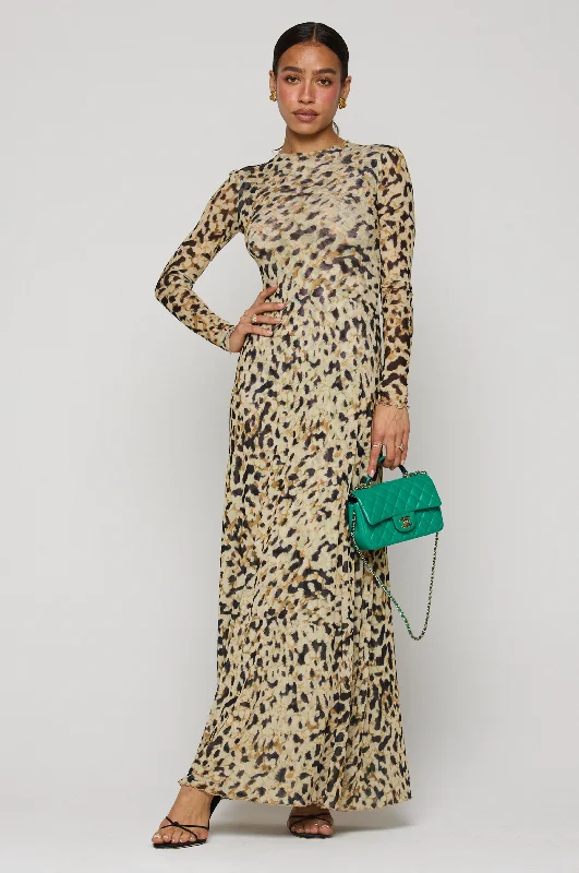 Maxi dresses with a criss - cross back for a flirty and unique detailLyon Dress in Balthazar Maxi dresses with a criss - cross back for a flirty and unique detailLyon Dress in Balthazar