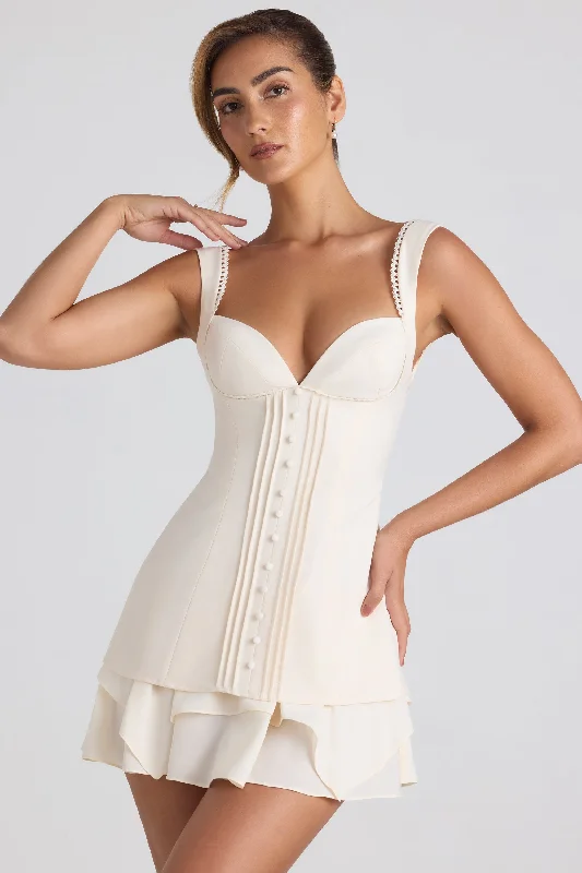 Mini dresses with embroidered details for a unique touchRuffle-Trim Button-Detail Corset Mini Dress in Ivory Mini dresses with embroidered details for a unique touchRuffle-Trim Button-Detail Corset Mini Dress in Ivory