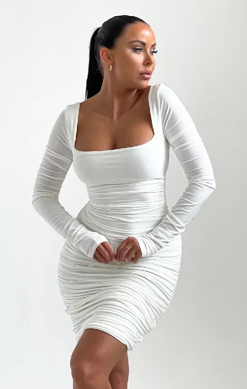 Mini dresses with tassel accents for a fun touchCream Long Sleeve Ruched Square Neck Mini Dress - Alix Mini dresses with tassel accents for a fun touchCream Long Sleeve Ruched Square Neck Mini Dress - Alix