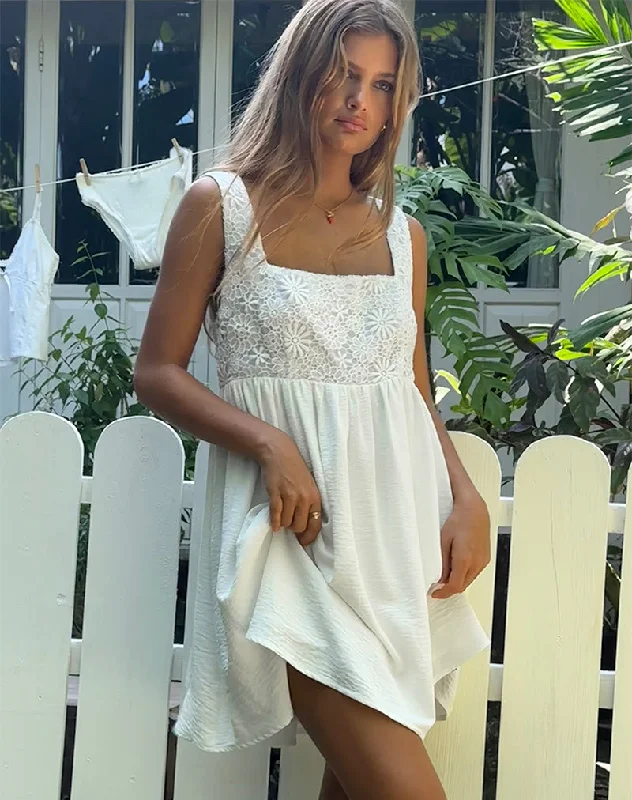 Mini dresses with embroidered details for a unique touchLiselotte Mini Dress in Ivory Mini dresses with embroidered details for a unique touchLiselotte Mini Dress in Ivory