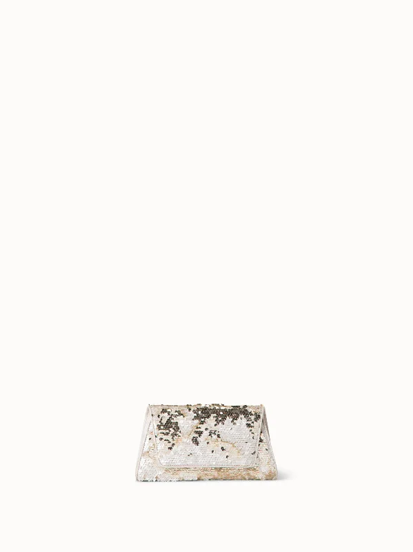 Women's denim jackets with a patchwork design for a bohemian and artsy styleAnouk Mini Trapezoid Clutch Women's denim jackets with a patchwork design for a bohemian and artsy styleAnouk Mini Trapezoid Clutch