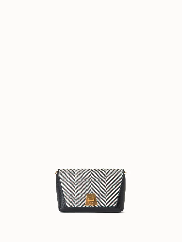 Women's cropped down jackets in bold colors for a sporty and fashionable winter outfitAnouk Small Day Bag Women's cropped down jackets in bold colors for a sporty and fashionable winter outfitAnouk Small Day Bag