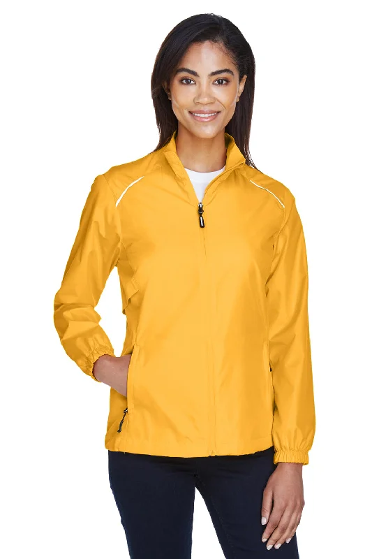 Women's quilted puffer jackets in a cropped silhouette for a modern twistCore 365 Womens Motivate Water Resistant Full Zip Jacket - Campus Gold Women's quilted puffer jackets in a cropped silhouette for a modern twistCore 365 Womens Motivate Water Resistant Full Zip Jacket - Campus Gold