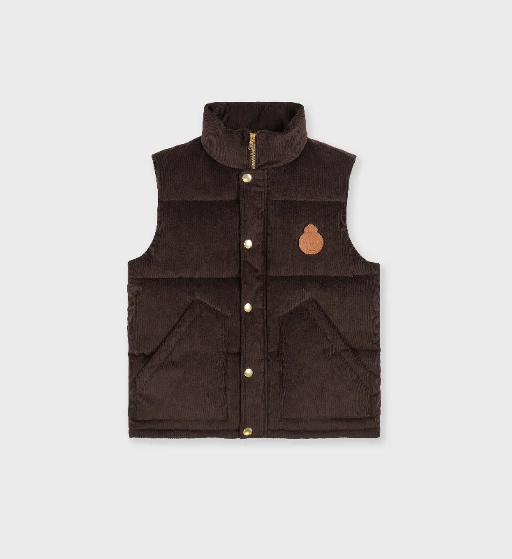 Long women's mac coats in a lightweight fabric for spring showersCrown Puffer Corduroy Vest - Chocolate Long women's mac coats in a lightweight fabric for spring showersCrown Puffer Corduroy Vest - Chocolate