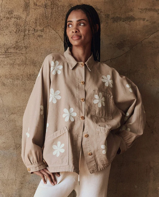 Women's quilted puffer jackets in a cropped silhouette for a modern twistThe Commodore Jacket with Daisy Stamp. -- Khaki with Daisy Stamp Women's quilted puffer jackets in a cropped silhouette for a modern twistThe Commodore Jacket with Daisy Stamp. -- Khaki with Daisy Stamp