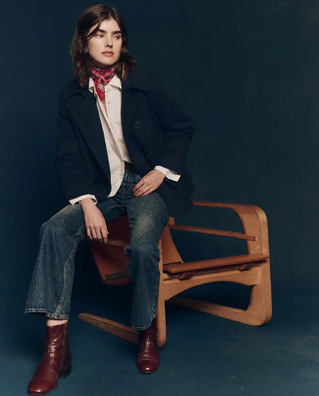 Women's denim jackets with a patchwork design for a bohemian and artsy styleThe Peacoat. -- Navy Women's denim jackets with a patchwork design for a bohemian and artsy styleThe Peacoat. -- Navy