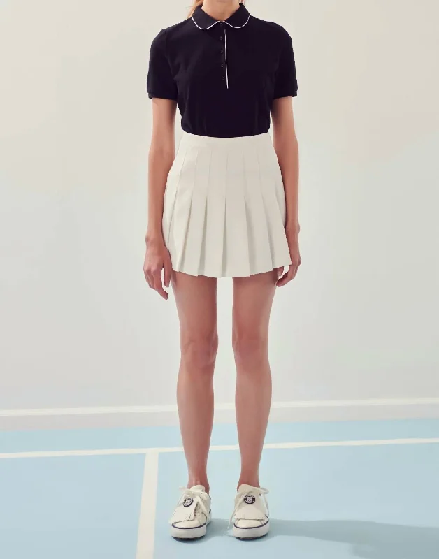 Button - through back polo shirt for a unique designPleated Tennis Skort In White